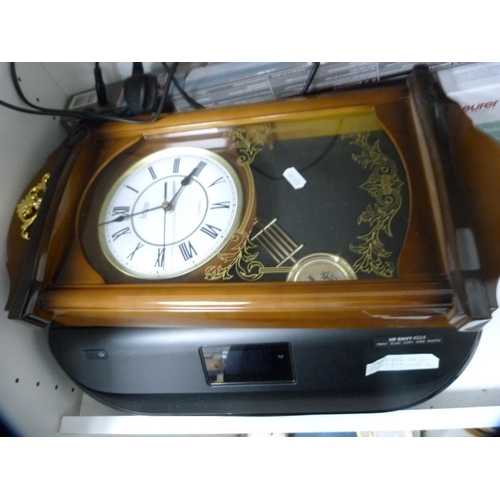 128 - Black attaché case, adjustable table, wall clock, printer etc (one shelf).