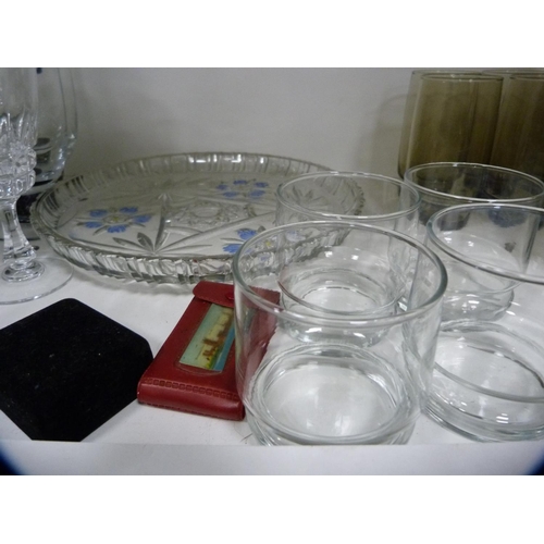 135 - Smokey glass lemonade set, other glassware etc (one shelf).