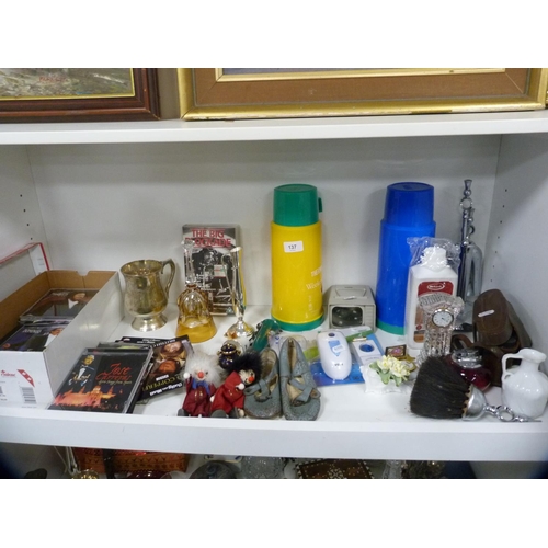 137 - Collection of decorative items including two Thermos flasks, CDs, tankard etc (one shelf).