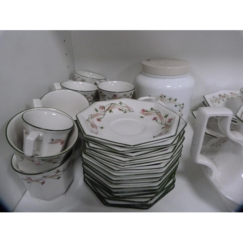 140 - Large collection of Johnson Bros 'Eternal Beau' dinner and teawares (two shelves).