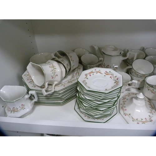 140 - Large collection of Johnson Bros 'Eternal Beau' dinner and teawares (two shelves).