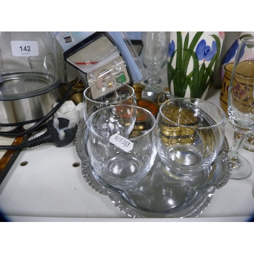 142 - Glass kettle, floral decorated vases, glassware etc (one shelf).