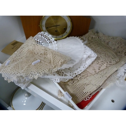 143 - Victorian photograph album, cream telephone, mantel clock and various table linen (one shelf).