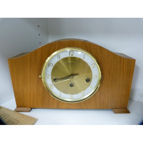 143 - Victorian photograph album, cream telephone, mantel clock and various table linen (one shelf).