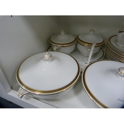 144 - Collection of Minton gilt decorated dinnerwares (one shelf).