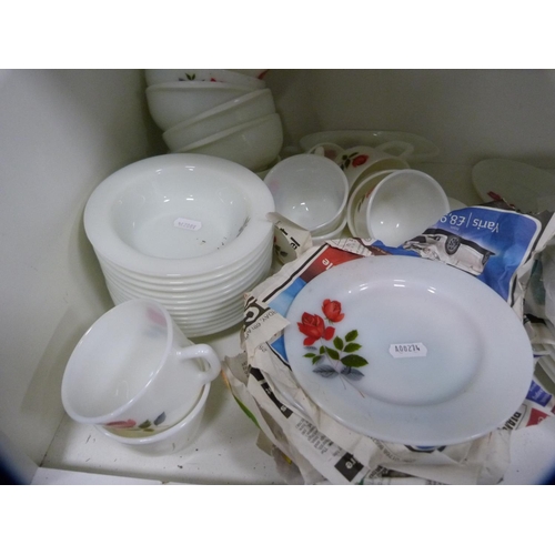 147 - Collection of floral decorated Pyrex dinnerwares (two shelves).