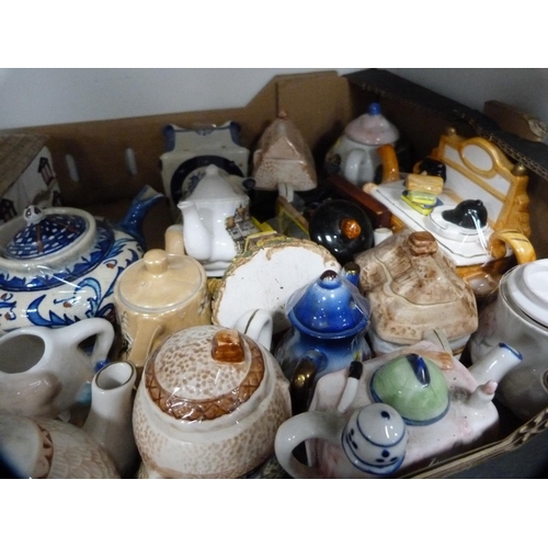 149 - Collection of novelty teapots and other decorative items (one shelf).