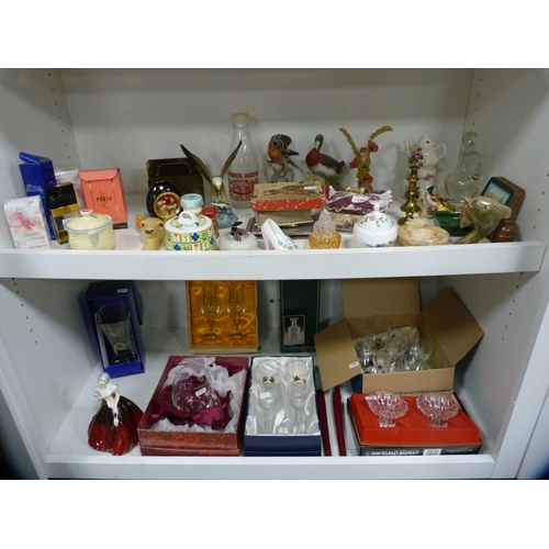 156 - Collection of cased glassware, decorative ceramics to include birds, perfumes etc (two shelves).