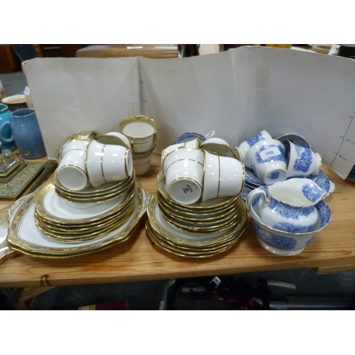 168 - Heathcote blue and white part tea set and a Roslyn gilt decorated tea set.