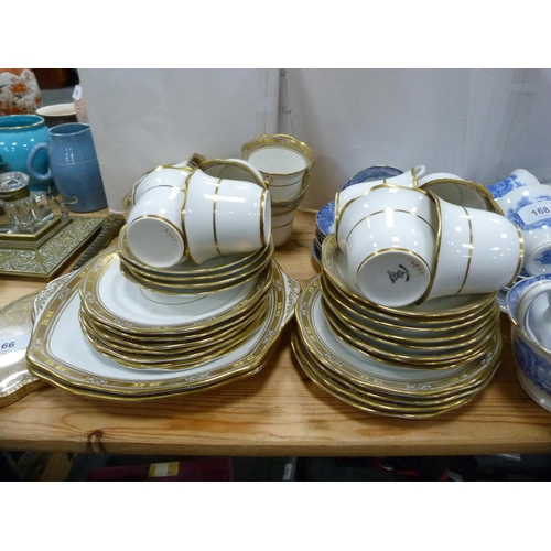 168 - Heathcote blue and white part tea set and a Roslyn gilt decorated tea set.