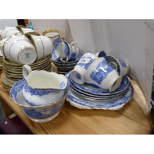 168 - Heathcote blue and white part tea set and a Roslyn gilt decorated tea set.