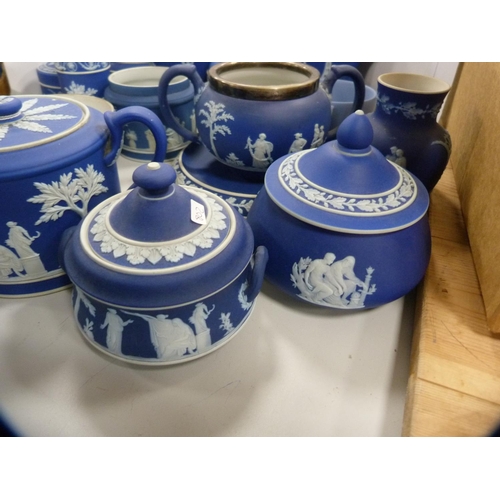 189 - Collection of blue Jasper ware jugs, boxes, dishes etc., some stamped Wedgwood.