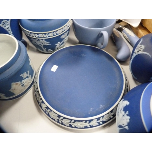 189 - Collection of blue Jasper ware jugs, boxes, dishes etc., some stamped Wedgwood.