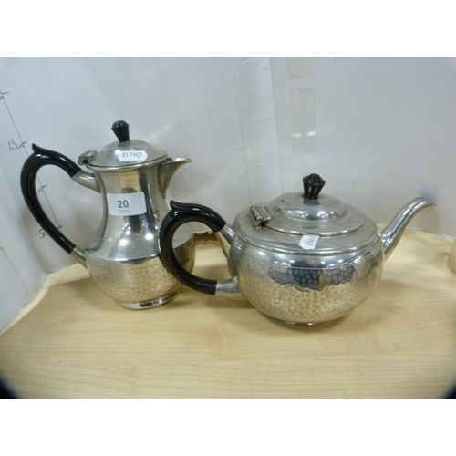 20 - Four-piece hammered pewter tea set.