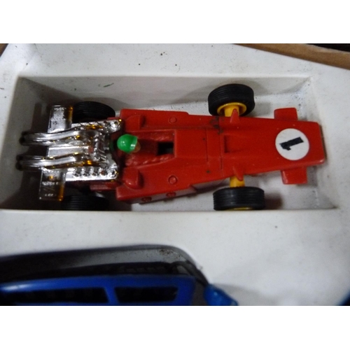 203 - Wooden box containing Scalextric accessories.