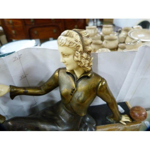 205 - Art Deco-style figure holding a bird, on plinth base.