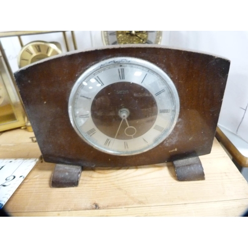 208 - Anniversary clock, four other clocks and parts.