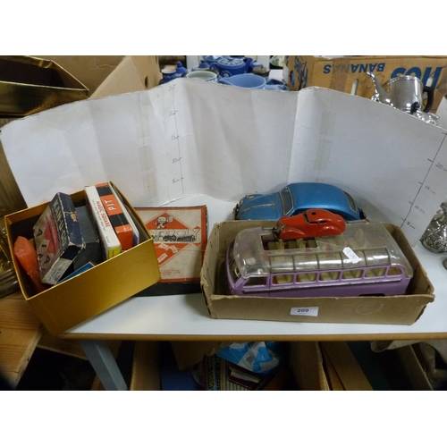 209 - Collection of vintage toys including Volkswagen car, bus, card games, Monopoly etc.