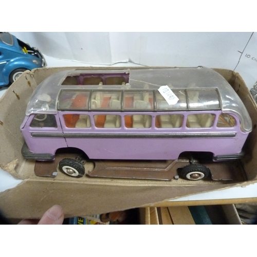 209 - Collection of vintage toys including Volkswagen car, bus, card games, Monopoly etc.