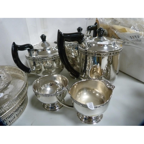 210 - Five-piece EP tea set with decorated border, galleried tray and other EP.