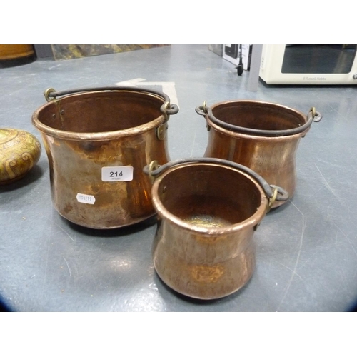 214 - Three antique copper pails.