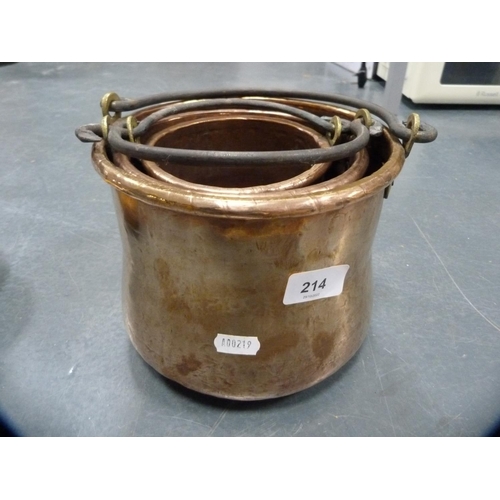 214 - Three antique copper pails.