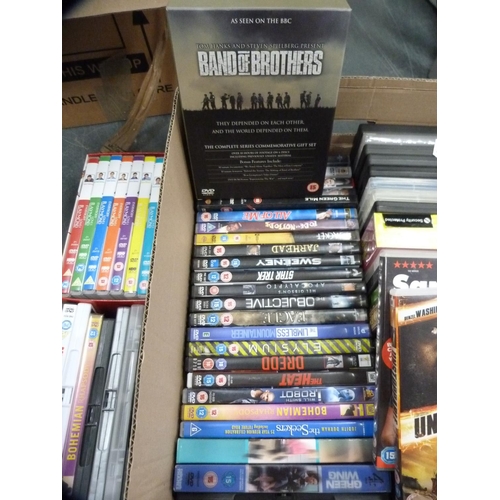 238 - Collection of assorted DVDs including television box sets and movies.