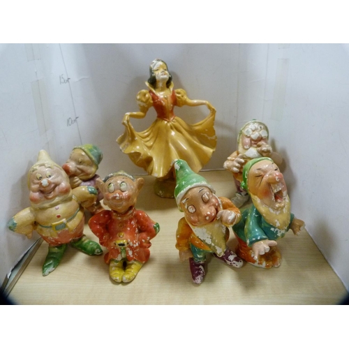 248 - Mantel clock, Wade Snow White and six Dwarfs, and an oriental figure.... 