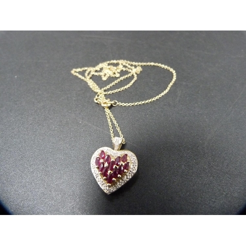 256 - 9ct gold, diamond and ruby-style heart-shaped pendant on 9ct gold chain, 3.6g gross.