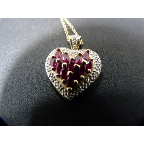 256 - 9ct gold, diamond and ruby-style heart-shaped pendant on 9ct gold chain, 3.6g gross.