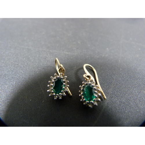 259 - Pair of 9ct gold, diamond and faux emerald cluster earrings set with diamond chips, 1.4g gross.