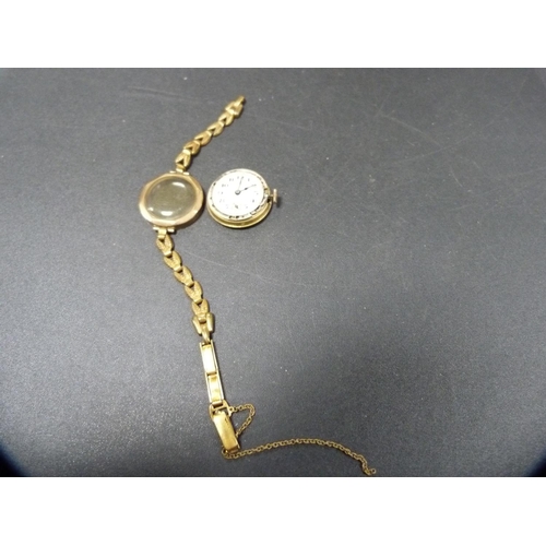 264 - 9ct gold-backed vintage lady's wristwatch.