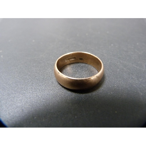 265 - 9ct gold band ring, 6.9g.