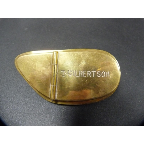 266 - Cowrie shell brass-mounted snuff box, engraved 'To T Gilbertson' on the underside.