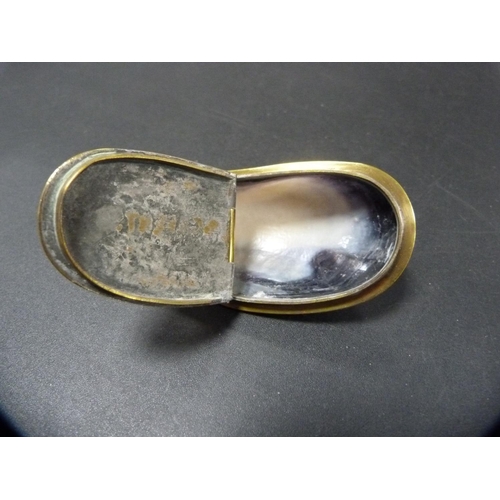 266 - Cowrie shell brass-mounted snuff box, engraved 'To T Gilbertson' on the underside.