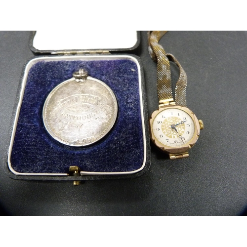 271 - Silver presentation medal, engraved and dated 1922/3, 25.6g, cased, and a vintage rolled gold lady's... 