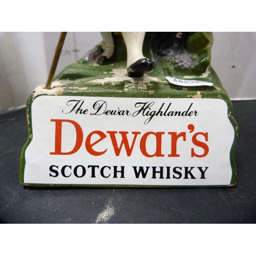 272 - Royal Doulton Dewar's Whisky jug and a Dewar's Highlander advertising figure.