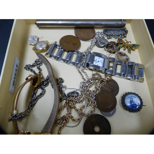 277 - Lady's fashion wristwatches, badges, Queen Elizabeth copper pennies and other coinage, clay cruisie-... 