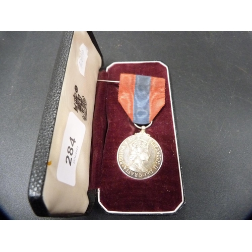 284 - Queen Elizabeth II Imperial Service medal with red and blue ribbon attachment, in Royal Mint box.