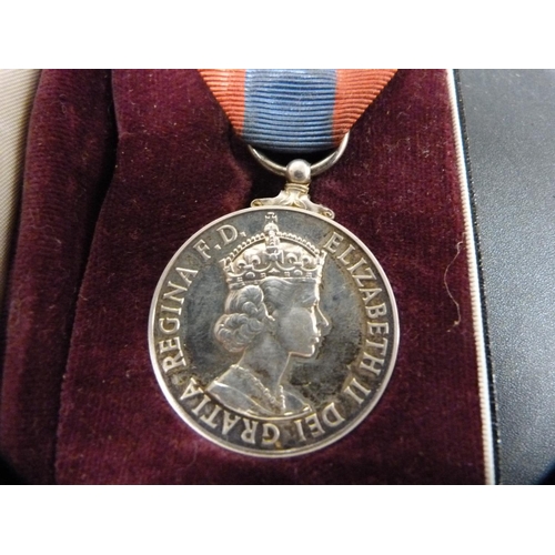 284 - Queen Elizabeth II Imperial Service medal with red and blue ribbon attachment, in Royal Mint box.