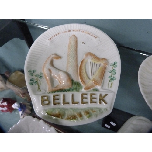 317 - Five pieces of Belleek porcelain to include a leaf-shaped dish, boat ornament, butter dish (black st... 