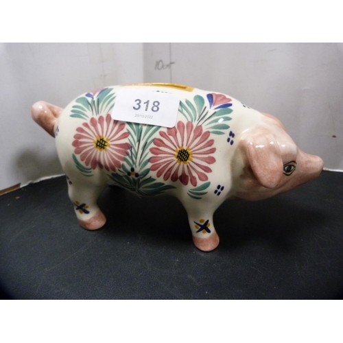 318 - Quimper coin bank modelled as a pig, initialled HB to the underside.