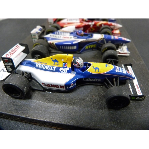 322 - Set of four model Williams F1 racing cars.