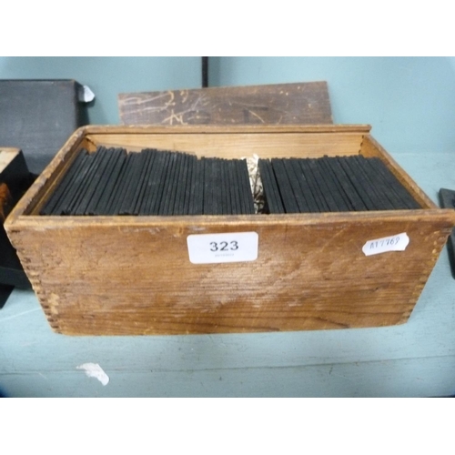 323 - Box containing a quantity of magic lantern slides.