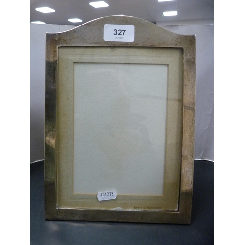 327 - Silver-mounted photograph frame, internal dimensions 15.5cm x 20.5cm.