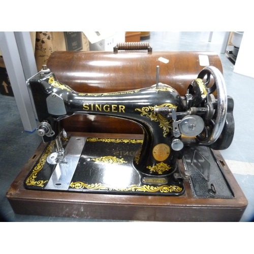 332 - Singer sewing machine.