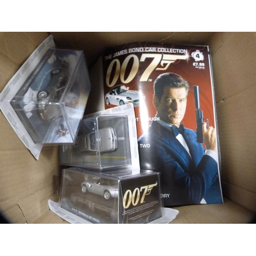 333 - Assorted James Bond Car Collection vehicles and magazines.