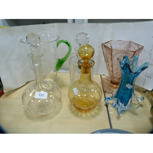 335 - Three decanters, engraved water jug and two vases.  (6)