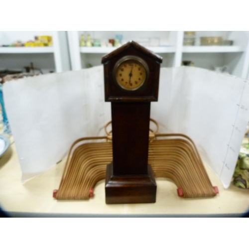 340 - Miniature longcase clock and a bag frame.