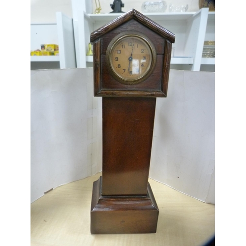 340 - Miniature longcase clock and a bag frame.